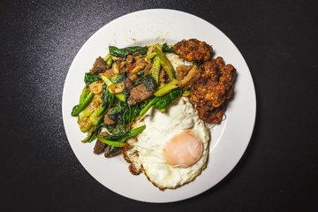 Fast food thailand Kale with Pork and Fried Egg