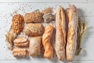 Rustic baguettes and buns for tasty breakfast
