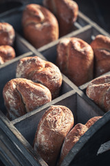 Delicious buns for healthy breakfast in wooden box