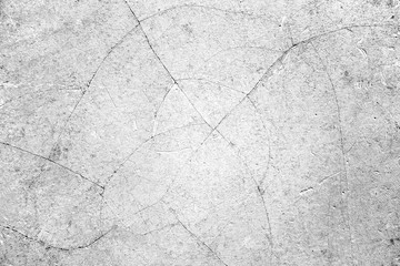 Obraz premium Raw old cement or concrete or plaster wall with stains and cracks for background and texture.