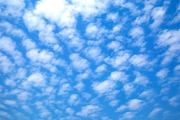 Blue sky with white clouds background