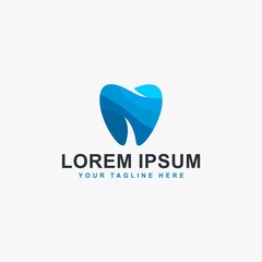 Dental clinic logo design. Dental care sign symbol. Tooth icon vector with polygonal blue colors. 