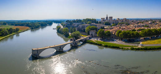 Famous old stone bridge and Rhone river in Avignon, France