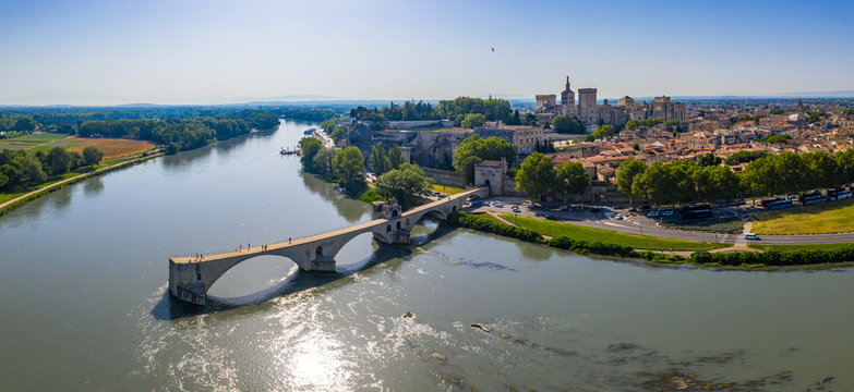 Famous Old Stone Bridge And Rhone River In Avignon, France