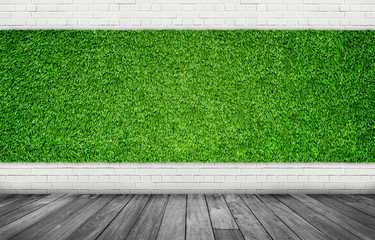 Exterior and Interior Design Concept : Empty space room of Green artificial grass with white brick...