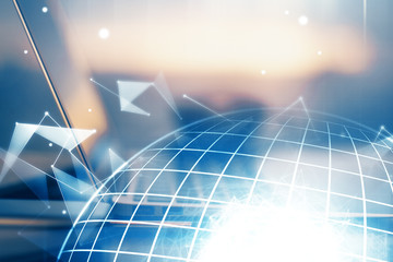 Multi exposure of table with computer and world map hologram. International data network concept.