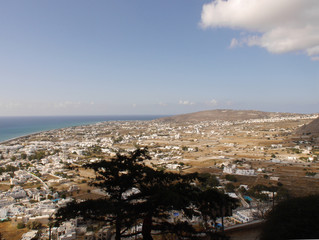 Panoramic view of the village of Perissa on Santorini island, from the top of the mountain. Aerial view of the Mediterranean Sea and beaches.