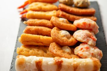 Japanese assorted fish cakes on white background 