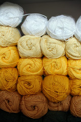 Fototapeta na wymiar yarn / Wool in all kinds of colors for knitting. Soft and cozy wool.