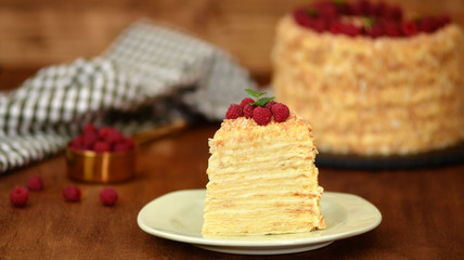 Slice Confectionery Napoleon Cake decorated with raspberry. Portion of Custard Cream Cake.