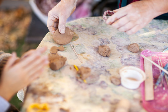 Children Make Clay Figures By Pottery