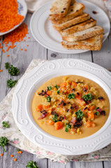 Carrot lentils cream with bacon