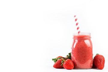 Fresh vegan drink, strawberry smoothie on a white background. Copy space