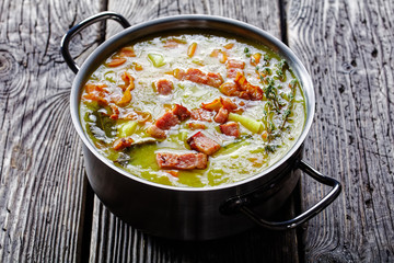 German pea stew erbseneintopf with bacon, close-up