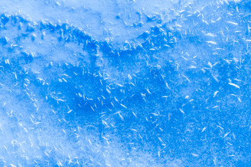 blue texture of an snow surface with pure ice white wave , blue cold clear cryslallized wall background ,decorative plaster background close up , abstract macro wallpaper