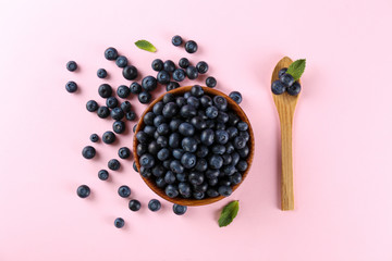 Perfectly ripe freshly picked local produce blueberries. Close up, copy space for text, top view, background. Healthy vegan snacks full of antioxidants. Seasonal summer berries.