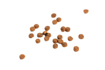 Naklejka premium Dry cat food isolated on white background close-up top view