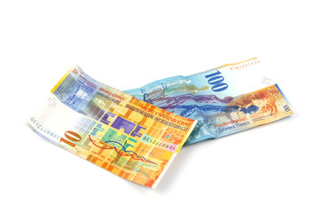 Swiss money isolated on white, hunderd and ten banknotes