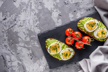 tasty and nutritious avocado sandwich and boiled egg