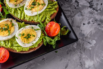 tasty and nutritious avocado sandwich and boiled egg