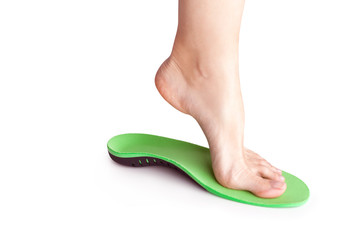 orthopedic insole and female leg