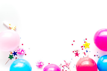 Decorative frame with colorful balloons on white background top-down frame copy space