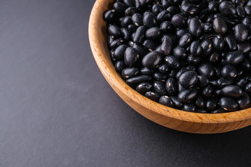 fresh organic natural beans on black background