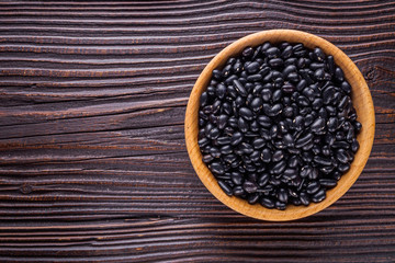 Fresh organic natural beans on wooden rustic background