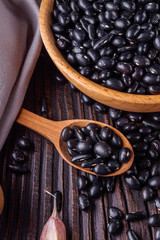 Fresh organic natural beans on wooden rustic background