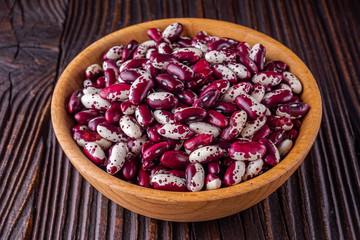 Fresh organic natural beans on wooden rustic background