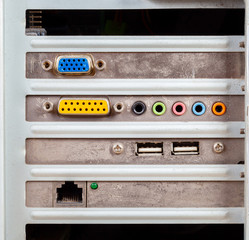 Old retro obsolete PC case back, expansion slots, backside of an midi tower type computer casing....