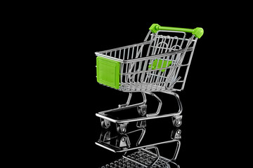 Cart on wheels isolated on a dark background.