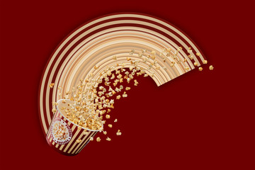 A paper bucket with popcorn flakes flying out of it, on a red background.