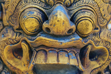 Fototapeta na wymiar Ancient Balinese statue at the temple in Bali