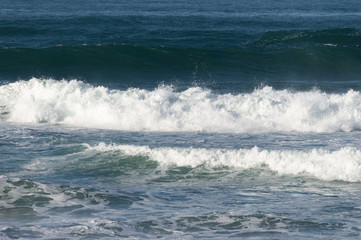 Sport surfing on the beach of zurriola located in san sebastian spain