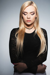Fototapeta premium Adorable lady posing in the studio