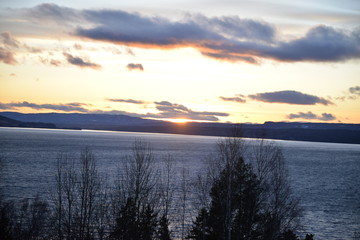 sunset over lake and mountain view 