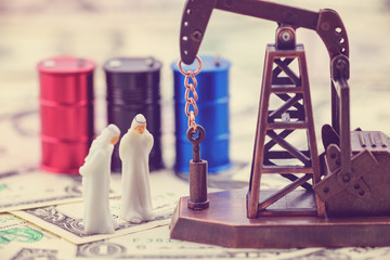 Crude oil price and world petroleum demand concept : Gulf oil owners talk on a spot price and trade...