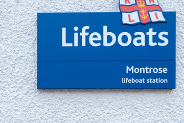 MONTROSE, SCOTLAND - 2015 OCTOBER 23. Blue sign of the Montrose Lifeboats Station.