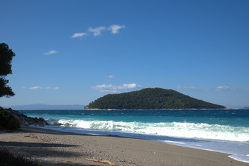 A beautiful beach on the island of Skopelos, Greece . her name is Kastani beach
