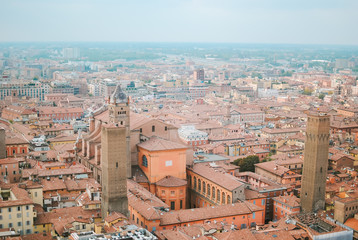 Aerial panoramic cityscape of Bologna, Italy. Rooftops of typical houses, ancient buildings and medieval towers