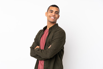 Young African American man over isolated white background with arms crossed and happy