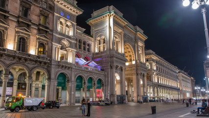 Obraz premium Night view of Vittorio Emanuele II Gallery timelapse in Milan, Italy