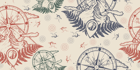 Mountains and compass. Seamless pattern. Packing old paper, scrapbooking style. Vintage background. Medieval manuscript, engraving art. Symbol of tourism, rock climbing, camping © intueri