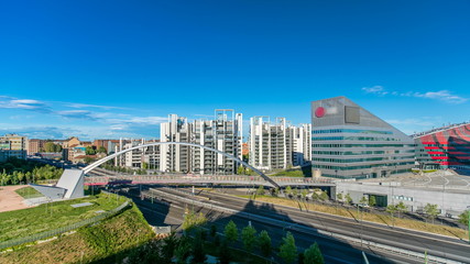Obraz premium Modern bridge and buildings in the new area of Portello timelapse, Milan, Italy