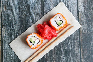 Fresh sushi rolls close up, top view