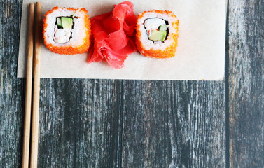 Fresh sushi rolls close up, top view