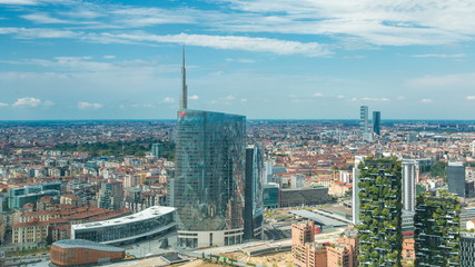 Milan aerial view of modern towers and skyscrapers and the Garibaldi railway station in the business district timelapse