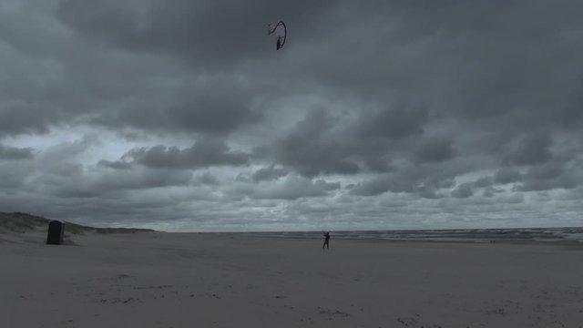 kite surfer and storm.