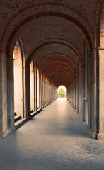 Fototapeta na wymiar Ancient arched corridor built in brick